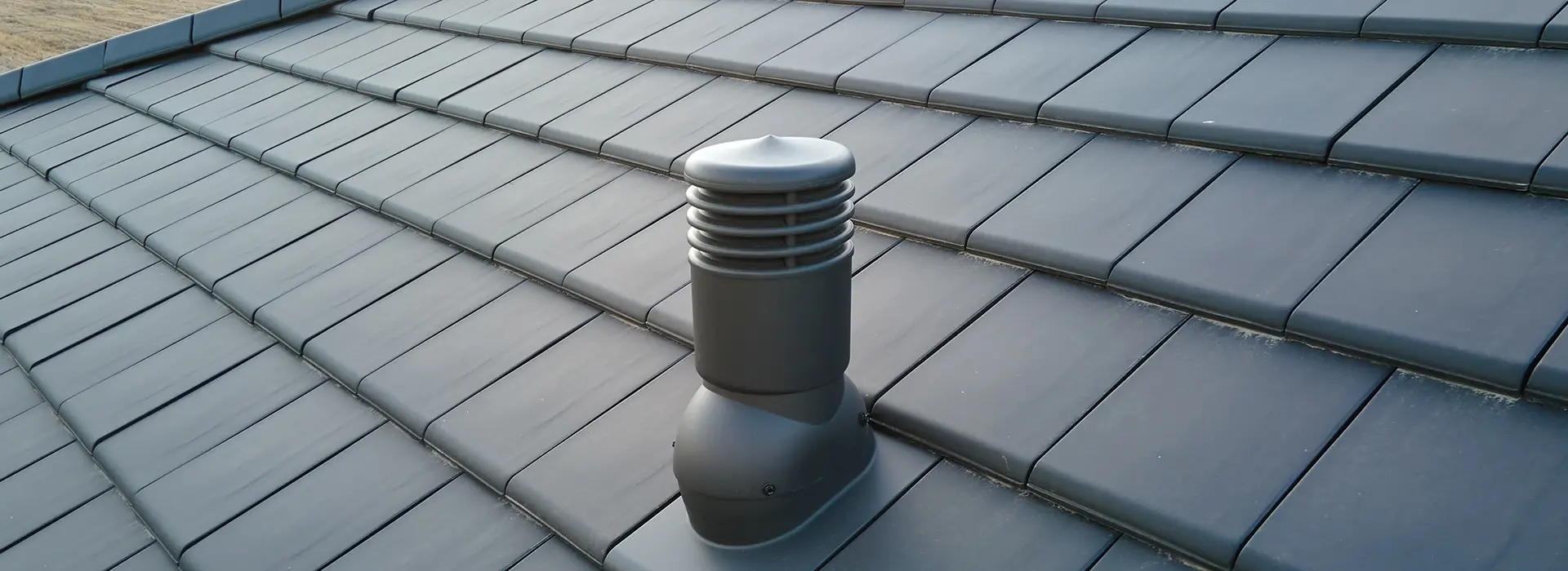 https://www.igt-vertrieb.de/wp-content/uploads/2023/10/closeup-of-ventilation-pipe-on-house-roof-top-cove-2022-06-18-00-36-17-utc_banner.webp